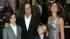 Kenny G, second from left, Lyndie Benson, right,...