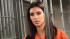 Kim Kardashian appears in a promotional photo...
