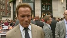 Arnold Schwarzenegger talks to the Associated Press at the London premiere of The Expendables 2 on August 13, 2012. - Provided courtesy of none / AP