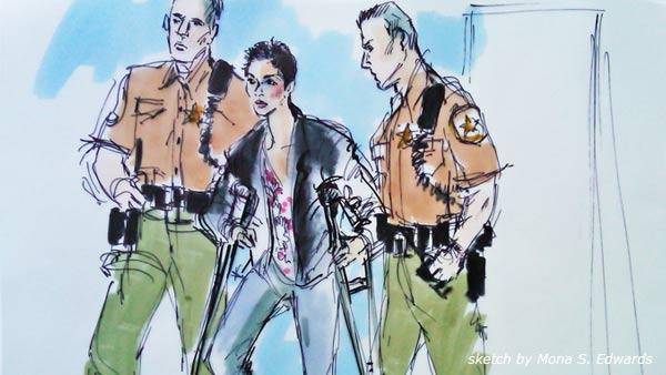 Actress Halle Berry is seen walking into a Los Angeles courthouse on crutches on Tuesday, Jan. 24, 2012.