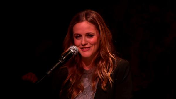 Alicia Silverstone speaks at Alanis Morissette's induction ceremony at the Guitar Center's Hollywood RockWalk on Aug. 21, 2012.