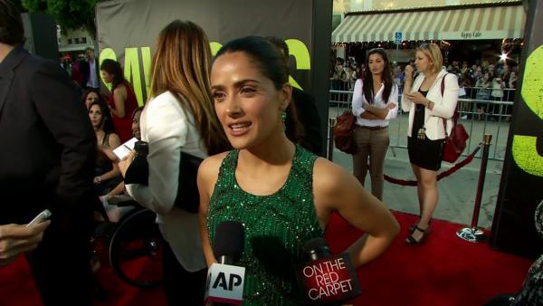 Salma Hayek talks to OnTheRedCarpet.com at the premiere of Oliver Stone's film 'Savages' in Los Angeles on June 25, 2012.