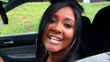 Snooki is seen in a vehicle, on her way to meet her fellow Jersey Shore cast members on episode 1 of the show, which aired in December 2009. - Provided courtesy of MTV / Viacom