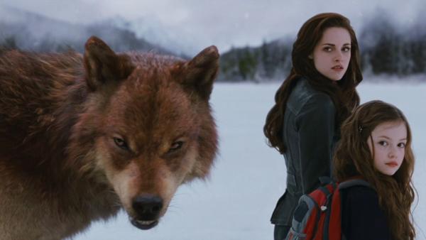 Bella and Renesmee (Kristen Stewart and Mackenzie Foy) and a werewolf appear in a scene from the 2012 movie 'The Twilight Saga: Breaking Dawn - Part 2.'