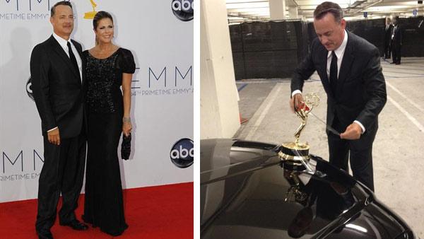 Tom Hanks and wife Rita Wilson appear on the red carpet at the Emmy Awards in Los Angeles on Sept. 23, 2012. / Tom Hanks tapes an Emmy to the hood of a car, as seen in this photo Tweeted by his wife, Rita Wilson, on Sept. 23, 2012. - Provided courtesy of Rick Rowell / twitter.com/RitaWilson Tom Hanks and wife Rita Wilson appear on the red carpet at the Emmy Awards in Los Angeles on Sept. 23, 2012. / Tom Hanks tapes an Emmy to the hood of a car, as seen in this photo Tweeted by his wife, Rita Wilson, on Sept. 23, 2012. - Provided courtesy of Rick Rowell / twitter.com/RitaWilson