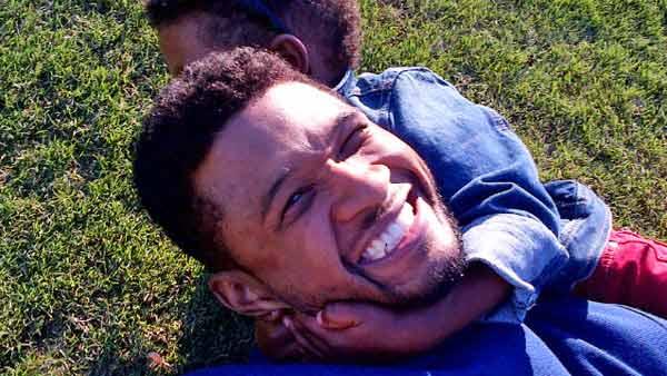 Usher and his son appear in a photo posted on the singer's official Twitter page on October 18, 2012.