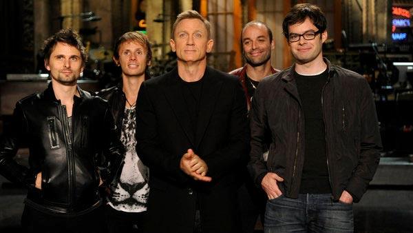 Daniel Craig and Muse appear in a promotional photo for Saturday Night Live in October 2012. - Provided courtesy of NBC Daniel Craig and Muse appear in a promotional photo for Saturday Night Live in October 2012. - Provided courtesy of NBC