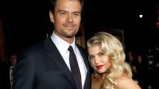 Josh Duhamel, left, and Fergie arrive at the premiere of New Years Eve in Los Angeles on Monday, Dec. 5, 2011. - Provided courtesy of AP / Matt Sayles
