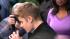 Oprah Winfrey watches on while Justin Bieber...