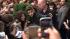 Justin Bieber poses with fans following a...