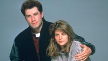 Kirstie Alley and John Travolta appear in a promotional photo for Look Whos Talking. - Provided courtesy of TriStar Pictures