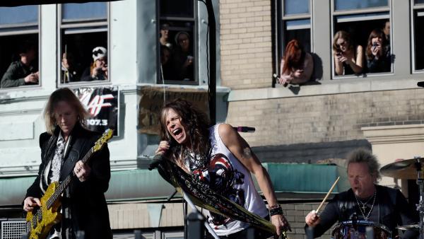Aerosmith performs a free concert in Boston front of the rockers former apartment in Boston on Nov. 5, 2012. - Provided courtesy of AP / Elise Amendola
