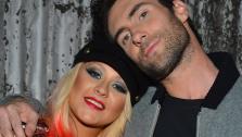 The Voice coaches Christina Aguilera and Adam Levine appear at the House of Blues in Los Angeles on Nov. 8, 2012 for the NBC shows special concert to celebrate the announcement of the top 12. - Provided courtesy of Frazer Harrison / NBC