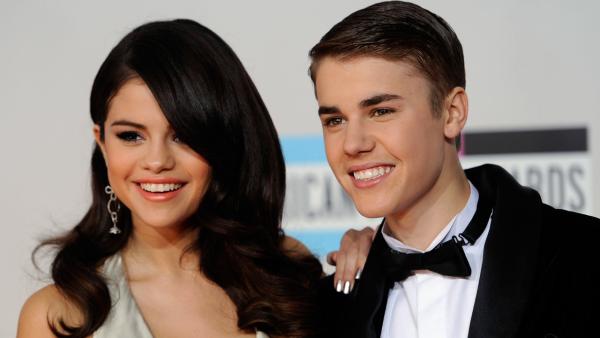 Selena Gomez, left, and Justin Bieber arrive at the 39th Annual American Music Awards on Sunday, Nov. 20, 2011 in Los Angeles. - Provided courtesy of AP / Chris Pizzello Selena Gomez, left, and Justin Bieber arrive at the 39th Annual American Music Awards on Sunday, Nov. 20, 2011 in Los Angeles. - Provided courtesy of AP / Chris Pizzello
