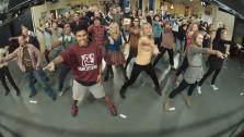 The Big Bang Theory cast and crew appear in a still from their flashmob, which took place on October 23, 2012. - Provided courtesy of youtube.com/watch?featureplayer_embedded&vdql26ssMcVI