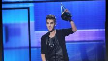 Justin Bieber appears on stage after winning an award at the 40th Anniversary American Music Awards on Sunday, Nov. 18, 2012, in Los Angeles. - Provided courtesy of ABC / Todd Wawrychuck