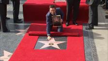 Hugh Jackman appears with his star on the Hollywood Walk of Fame on December 13, 2012. - Provided courtesy of OTRC