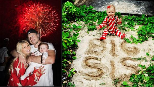 Jessica Simpson, Eric Johnson and their daughter Maxwell Drew appear in a photo posted on Simpson's Twitter page on July 5, 2012. / The couple's daughter Maxwell Drew is pictured in a photo posted on Simpson's Twitter page on Dec. 25, 2012.