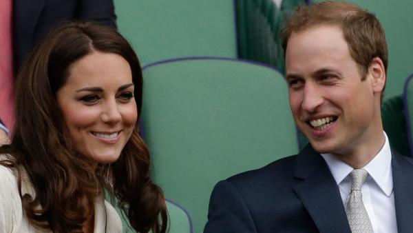 Britain's Prince William, right, and Kate, Duchess of Cambridge watch Roger Federer of Switzerland play Mikhail Youzhny of Russia during a quarterfinals match at the All England Lawn Tennis Championships at Wimbledon, England, Wednesday July 4, 2012.
