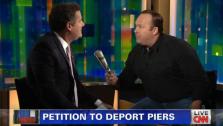 Piers Morgan and Alex Jones appear on Piers Morgan Tonight on Jan. 7, 2013. - Provided courtesy of CNN