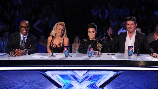 L.A. Reid, Britney Spears, Demi Lovato and Simon Cowell appear on FOXs The X Factor on Nov. 28, 2012. - Provided courtesy of Ray Mickshaw / FOX L.A. Reid, Britney Spears, Demi Lovato and Simon Cowell appear on FOXs The X Factor on Nov. 28, 2012. - Provided courtesy of Ray Mickshaw / FOX