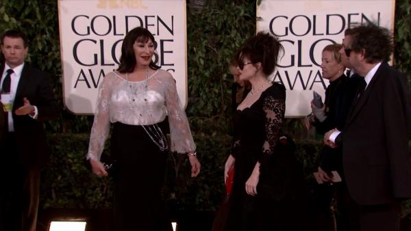 Anjelica Huston appears with Helena Bonham Carter and Tim Burton at the 2013 Golden Globe Awards in Beverly Hills, California on Jan. 13, 2013.