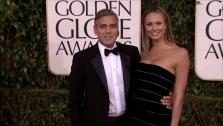 George Clooney and Stacy Keibler appear at the 2013 Golden Globe Awards in Beverly Hills, California on Jan. 13, 2013. - Provided courtesy of OTRC