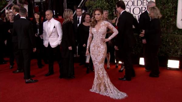 Jennifer Lopez appears at the 2013 Golden Globe Awards in Beverly Hills, California on Jan. 13, 2013. Her boyfriend, Casper Smart, is picture on the left.