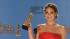 Jennifer Lawrence talks to reporters backstage...