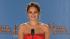 Jennifer Lawrence talks to reporters backstage...