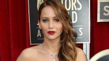 Jennifer Lawrence appears on the cover of Marie Claire South Africa for the January 2013. / Jennifer Lawrence arrives for the 83rd Annual Academy Awards at the Kodak Theatre in Hollywood, CA on February 27, 2011. - Provided courtesy of Matt Sayles / AP