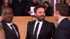 Ben Affleck and John Krasinki appear on the red carpet at the 2013 SAG Awards in Los Angeles on Jan. 27, 2012. - Provided courtesy of OTRC