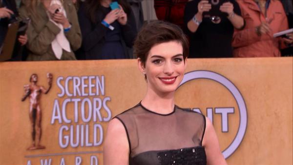 Anne Hathaway poses on the red carpet at the 2013 SAG Awards in Los Angeles on Jan. 27, 2012.