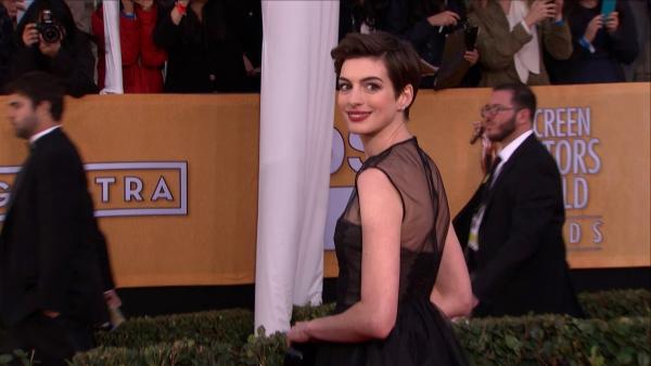 Anne Hathaway poses on the red carpet at the 2013 SAG Awards in Los Angeles on Jan. 27, 2012.