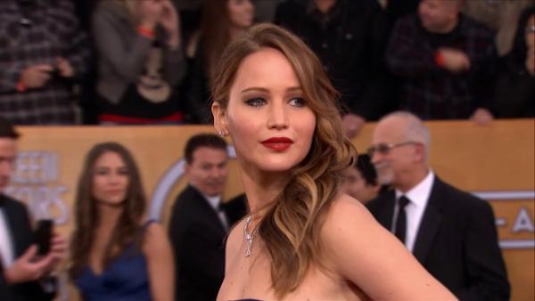 Jennifer Lawrence poses on the red carpet at the 2013 SAG Awards in Los Angeles on Jan. 27, 2012.