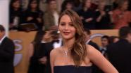 Jennifer Lawrence poses on the red carpet at the 2013 SAG Awards in Los Angeles on Jan. 27, 2012. - Provided courtesy of OTRC