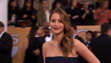Jennifer Lawrence poses on the red carpet at the 2013 SAG Awards in Los Angeles on Jan. 27, 2012.