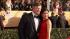Alec Baldwin and wife Hilaria Thomas pose on the...