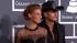 Faith Hill and husband Tim McGraw walk the red...