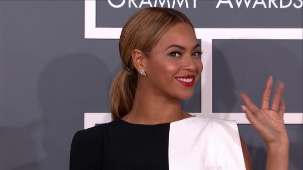 Beyonce wears a black and white Osman Spring 2013 jumpsuit on the 2013 Grammy Awards red carpet on Feb. 10, 2013.