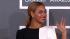 Beyonce wears a black and white Osman Spring...