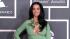 Katy Perry shows off cleavage in mint Gucci gown...
