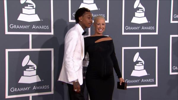 A pregnant Amber Rose and fiance Wiz Khalifa attend the 2013 Grammy Awards on Feb. 10, 2013.