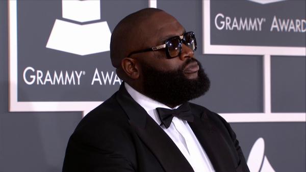 Rick Ross walks the 2013 Grammy Awards red carpet on Feb. 10, 2013.