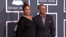 Jennifer Lopez and Casper Smart walk the red carpet at the 2013 Grammys on Feb. 10, 2013. - Provided courtesy of OTRC