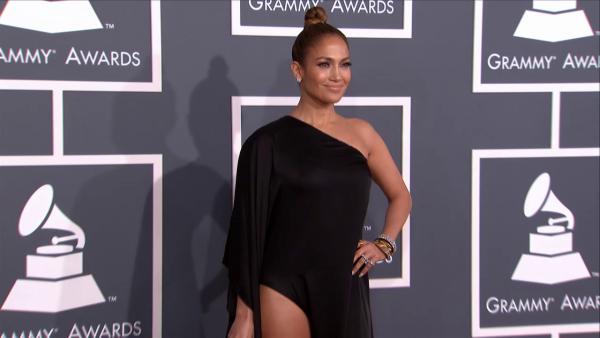 Jennifer Lopez and Casper Smart walk the red carpet at the 2013 Grammys on Feb. 10, 2013.