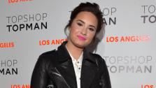 Demi Lovato arrives at the Topshop Topman LA Opening Party at Cecconis West Hollywood on February 13, 2013 in Los Angeles, California. - Provided courtesy of Photo / AP / Lester Cohen