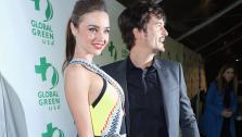 Victorias Secret supermodel Miranda Kerr and husband and actor Orlando Bloom attend Global Green USAs 10th annual Pre-Oscars Party at the Avalon club in Hollywood, California on Feb. 20, 2013.