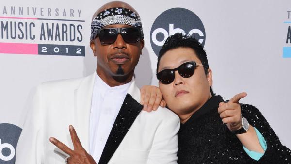 M.C. Hammer and PSY appear in a photo from the American Music Awards on November 18, 2013. - Provided courtesy of ABC M.C. Hammer and PSY appear in a photo from the American Music Awards on November 18, 2013. - Provided courtesy of ABC