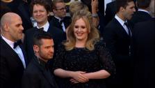 Adele walks the red carpet at the 2013 Oscars on Sunday, February 24.
